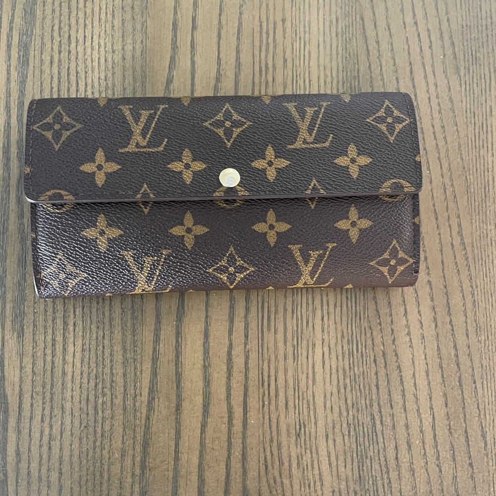 Louis Vuitton Brown Wallet with Iconic Monogram Design